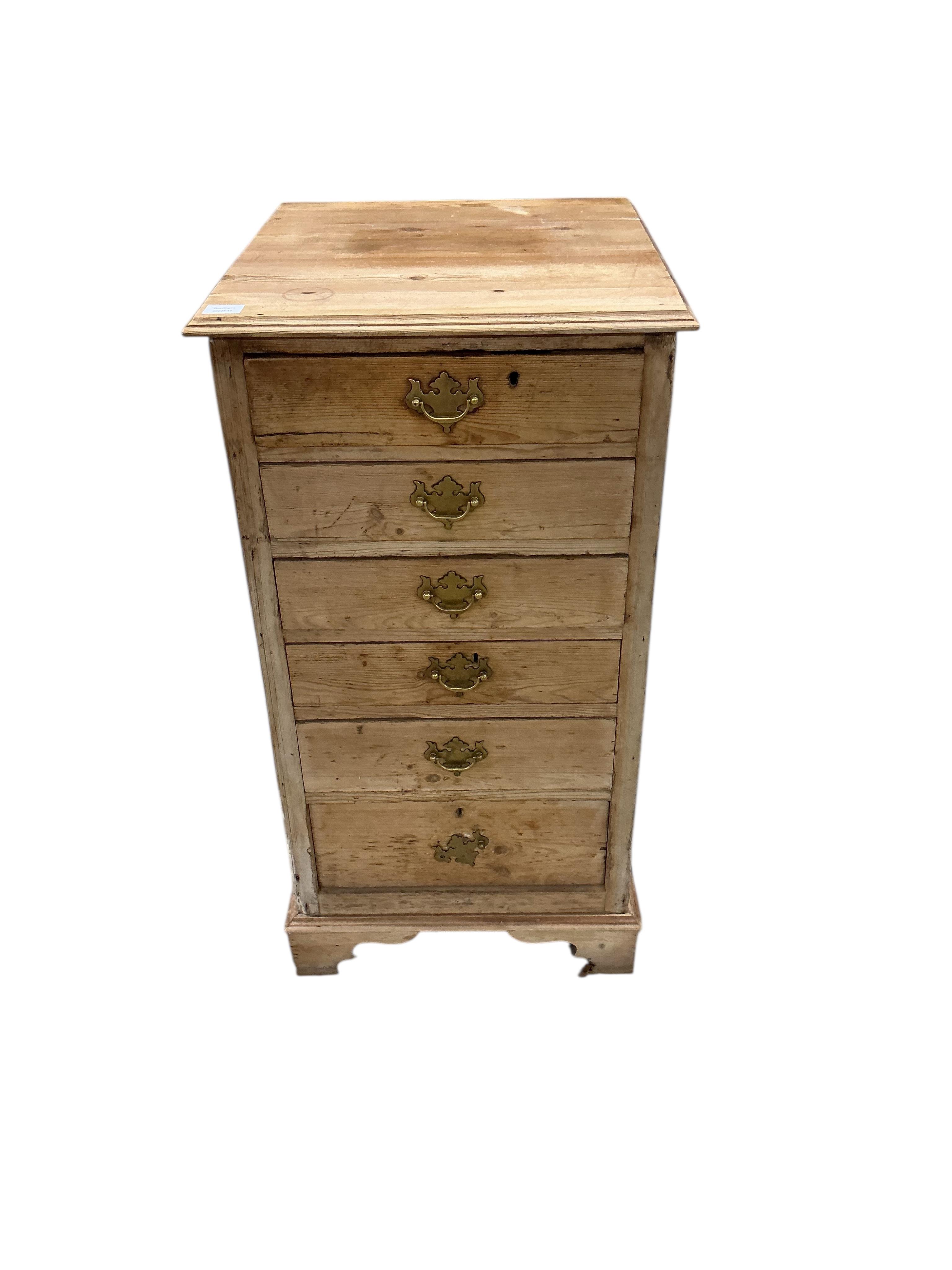 An early 19th century narrow pine chest of six drawers, width 54cm, depth 59cm, height 103cm
